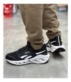 کتونی ریباک مدل فلوت زیگ مشکی / سفید