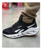 کتونی ریباک مدل فلوت زیگ مشکی / سفید